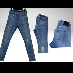FAIRLY NEW LEVIS MADE AND CRAFTED BLUE JEANS WITH RIPS. SIZE 27-32